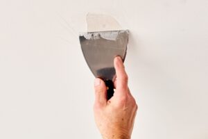 How to Fix Nail Pops in Drywall Before Painting