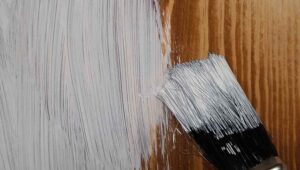 How to Paint Over Stained Wood Without Bleeding