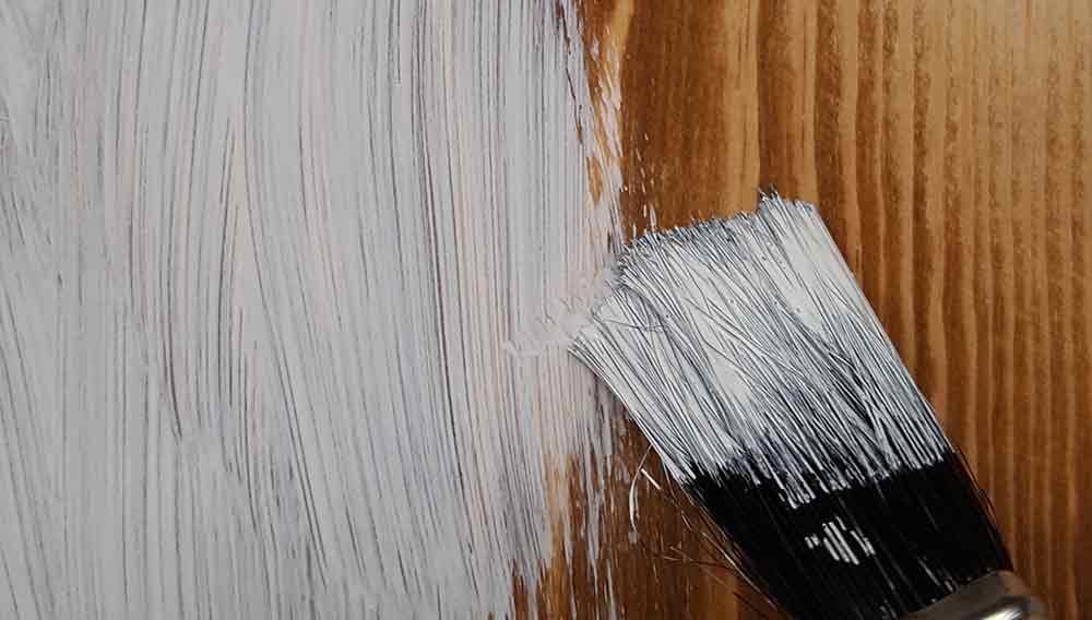 How to Paint Over Stained Wood Without Bleeding